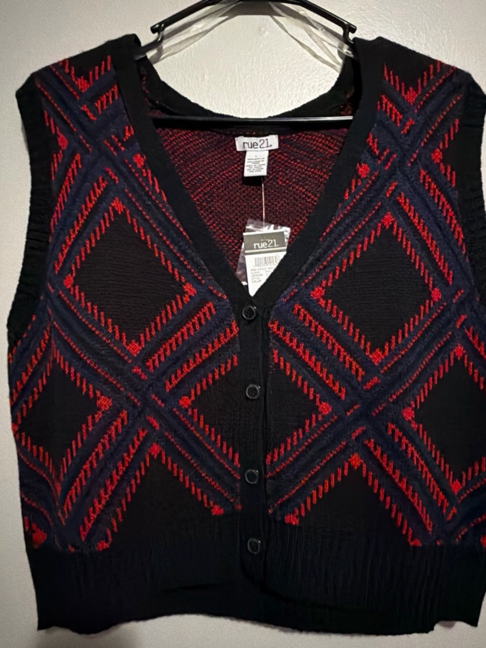 knit sweater vest with red & navy geometric pattern